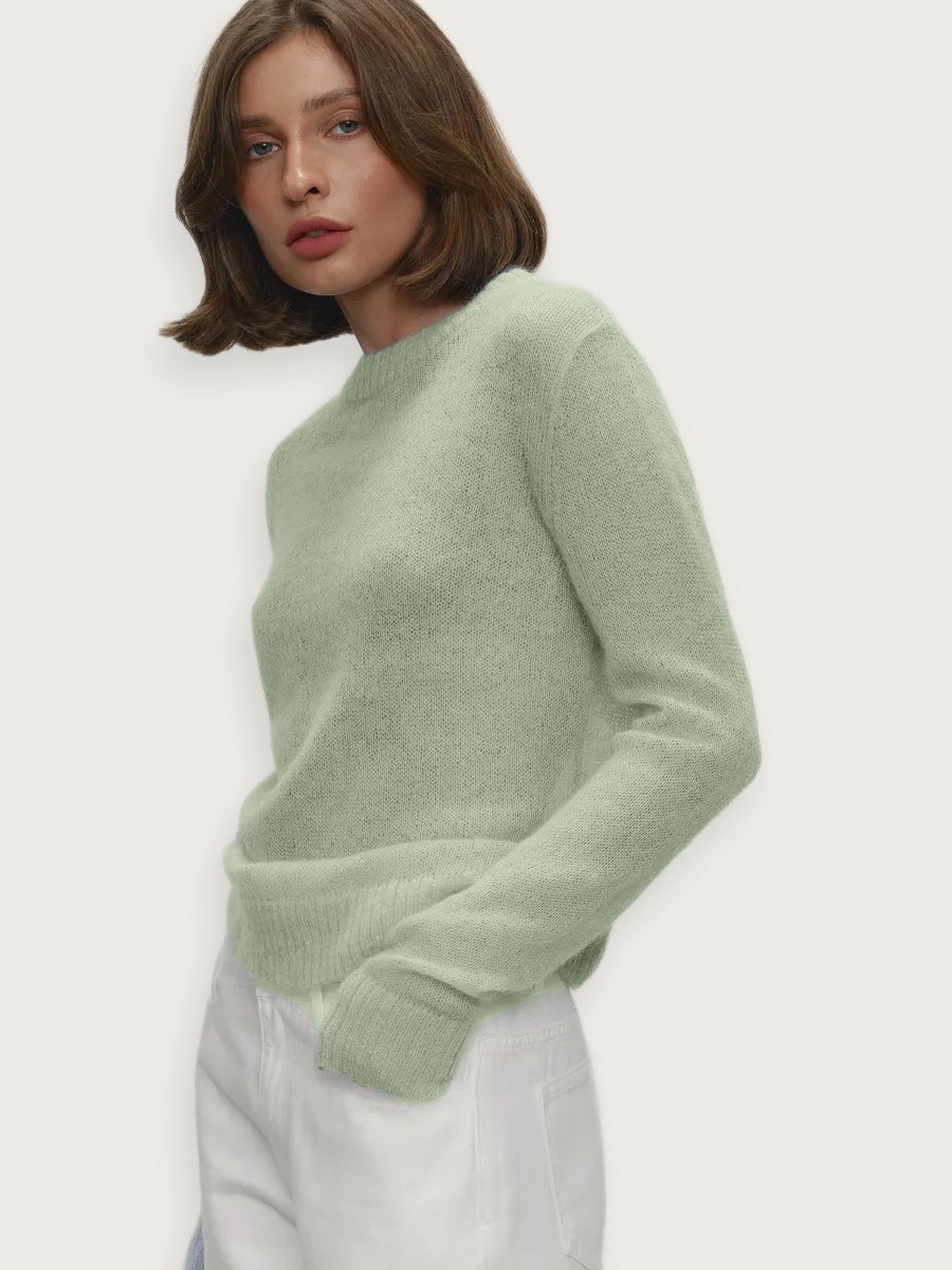 Genomskinlig stickad poncho – Rundhalsad i candyfärg