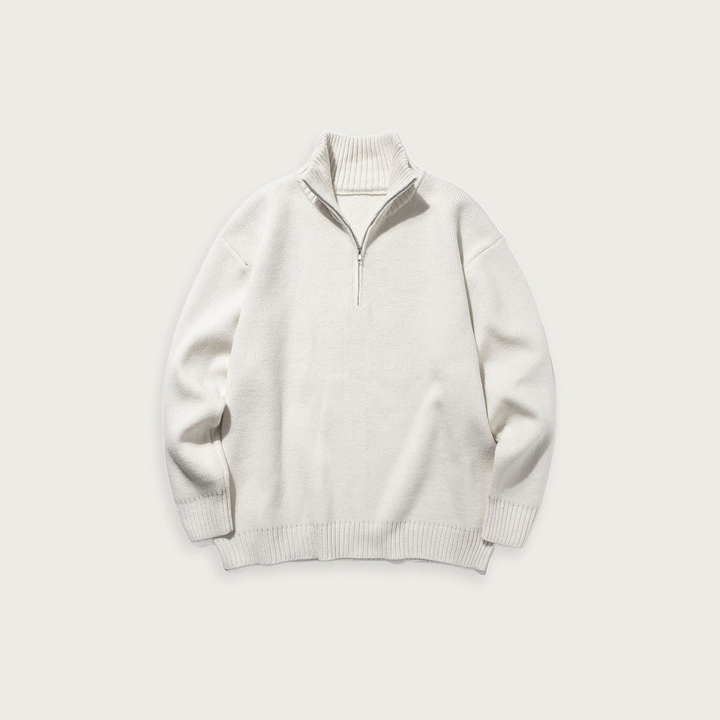 Enfärgad stickad halvpolo – Minimalistisk design