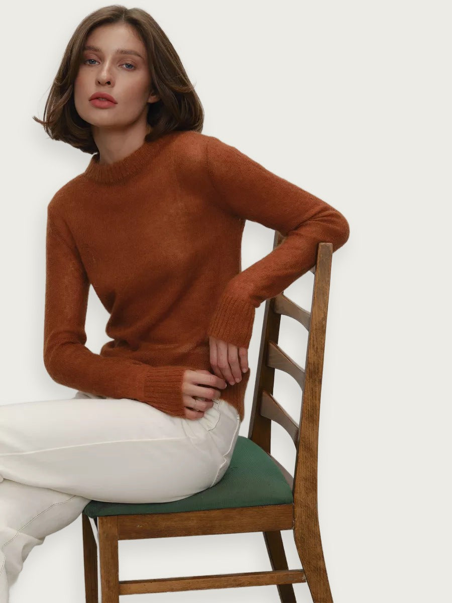 Genomskinlig stickad poncho – Rundhalsad i candyfärg