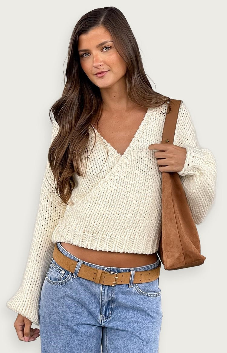 Kort stickad kofta med korsband – V-ringad modell